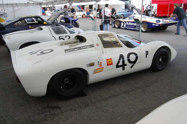 A white 1968 Porsche 907 in the paddock at Rennsport Reunion IV at Laguna Seca in 2011