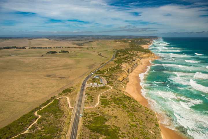 The Great Ocean Road running beside the surf on the Victorian coast