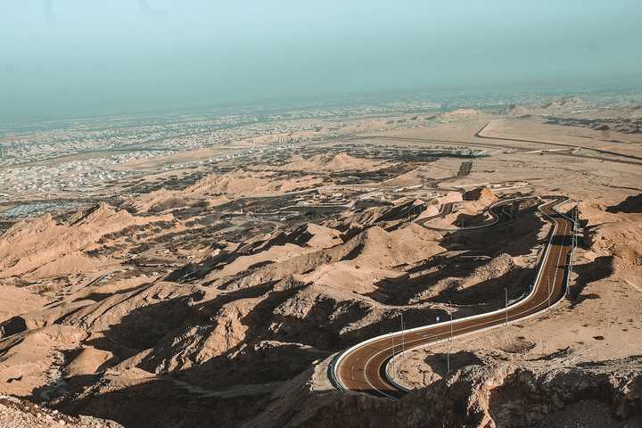 Jebel Hafeet Mountain Road winding up bare desert rock near Al Ain