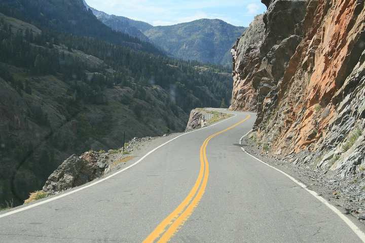 The Million Dollar Highway cut into the cliffs of the Uncompahgre Gorge