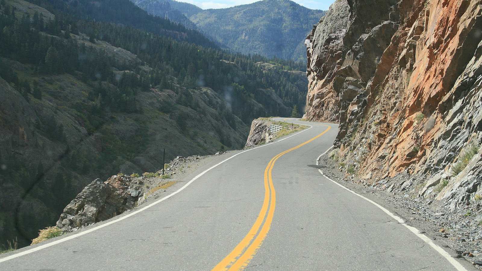 The Million Dollar Highway cut into the cliffs of the Uncompahgre Gorge